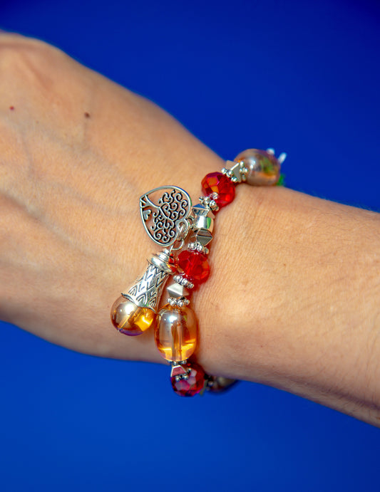 Pulsera de cristal y dijes Raíces de Luz
